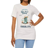 Female model wearing Beach Paradise Cowgirl Style t-shirt in vintage white